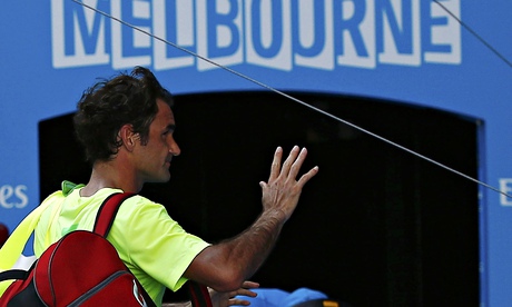 Roger Federer leaves Rod Laver Arena following his third-round defeat to Andreas Seppi