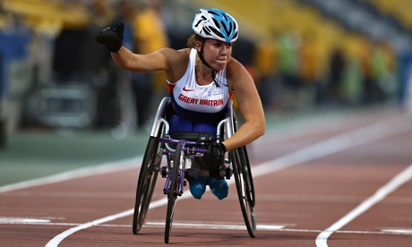 Britain's Hannah Cockroft wins the women's 100m T34 final at the world championships in Doha.