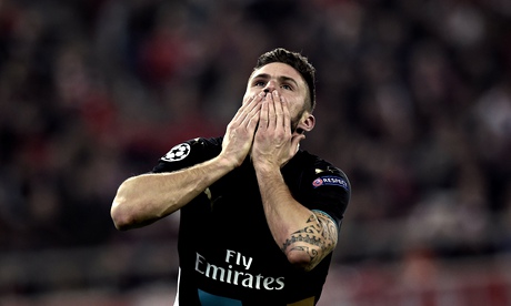 Olivier Giroud celebrates scoring one of his three goals for Arsenal against Olympiakos