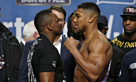 Anthony Joshua, right, and Dillian Whyte during their weigh in at the 02 Arena