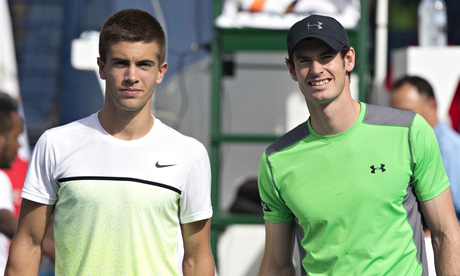 Andy Murray, right, poses with his conqueror, Borna Coric