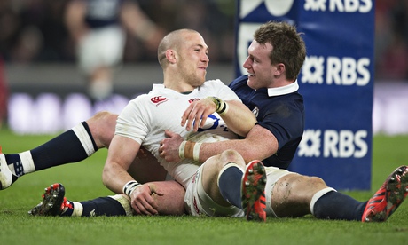 Mike Brown of England and Scotland's Stuart Hogg