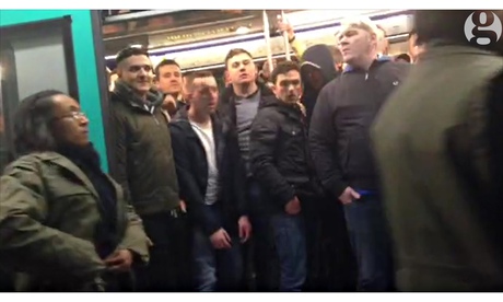 Chelsea fans prevent a black man boarding a metro train