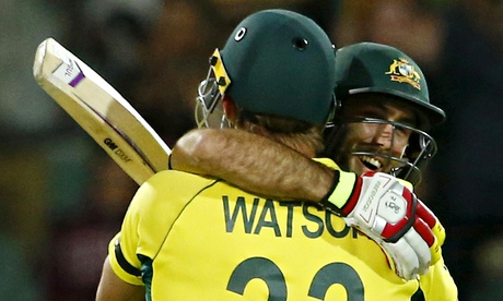 Glenn Maxwell, right, embraces his mentor Shane Watson after the quarter-final win over Pakistan.