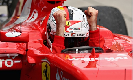 Sebastian Vettel celebrates his victory in Malaysia, Ferrari's first grand prix win since 2013.