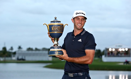 Dustin Johnson with the WGC-Cadillac Championship trophy