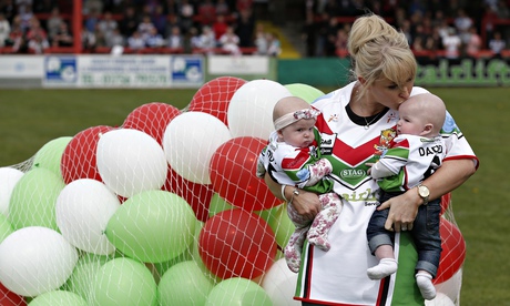 Danny Jones's wife Lizzie and their five-month-old twins aheas of Keighley's match against Coventry