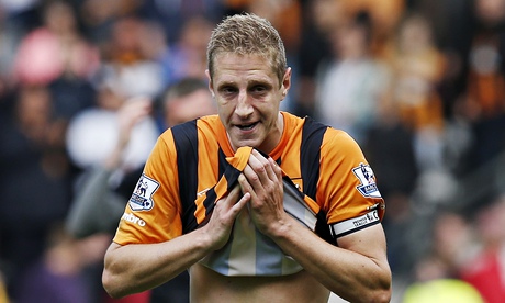 Michael Dawson looks dejected following Hull's relegation-confirming draw with Manchester United