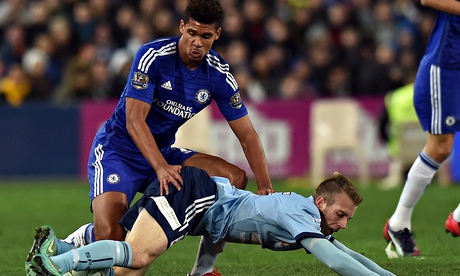 Ruben Loftus-Cheek, left, fights for possession with Andrew Hoole