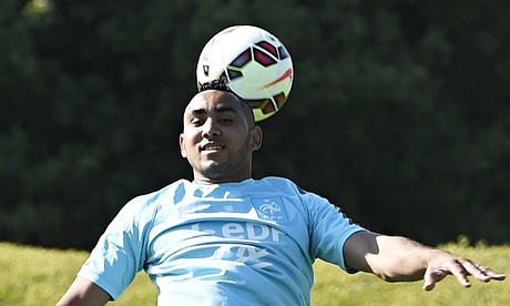 French forward Dimitri Payet heads the b