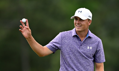 Jordan Spieth of the US waves to patrons