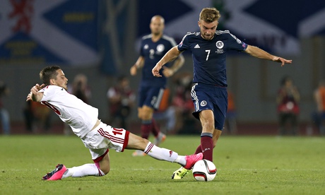 James Morrison is tackled by Zhano Ananidze of Georgia during Scotland’s defeat in Tbilisi. Photograph: Peter Cziborra/Reuters