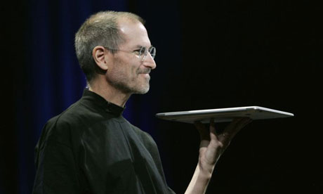 Steve Jobs with Apple's new lightweight laptop