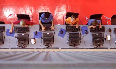 Schoolkids on computers