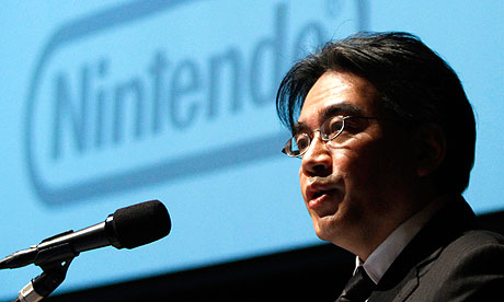 File photo of Nintendo Co President Iwata speaking in Tokyo