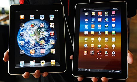 An Apple iPad, left, and a Samsung Galaxy tablet. Photograph: Jo Yong-Hak/Reuters