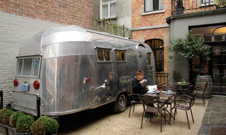 Airstream caravan on Vintage hotel forecourt