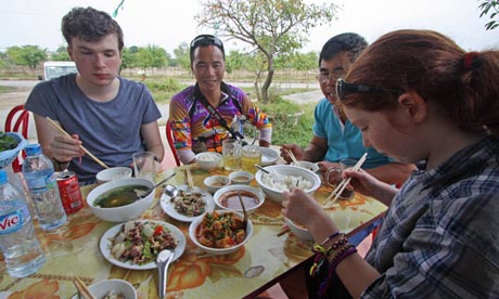 Niall, and Maddy tucking in to Vietnamese cuisine.