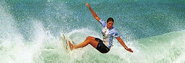 Surfing a wave in Hawaii