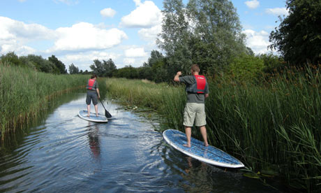 paddleboarding through Wicken Fen, East Anglia