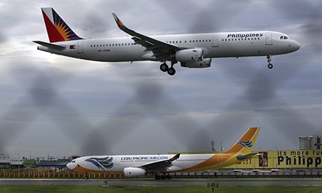 A plane landing in Manila as the Philippines' main international airportreopens.