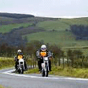 Charles Burgess and  instructor Toby Cooper cycling in the countryside around Builth Wells