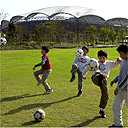 Children playing football, Japan