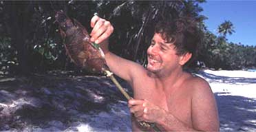 Ian Belcher spears a fish