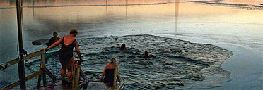 Plunging into the sea after a sauna in Finland