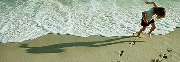 A child playing on the beach, Nantucket