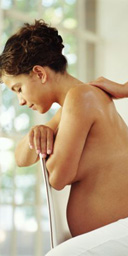 Pregnant woman being massaged