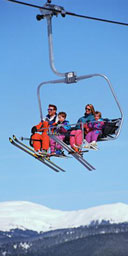 Skiers on a ski lift