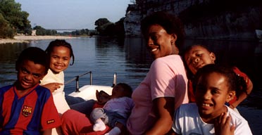 The Harker family relax on a pedalo in the Ardeche