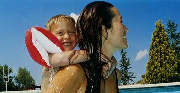 A mother and child in the pool