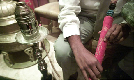 Arabs smoking a hookah pipe