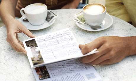 Guidebook and coffee