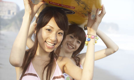 Girls on a beach in Shimoda, Japan