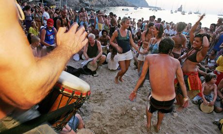 Revellers on Ibiza's Benirras beach