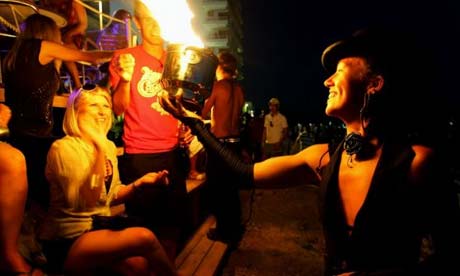 ... ... revellers on the beach ...