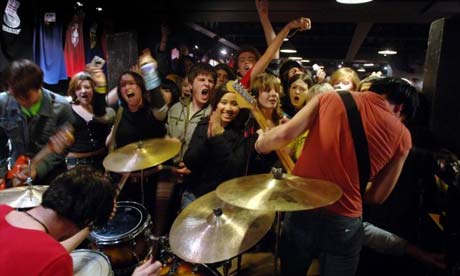 Band playing in a London record shop