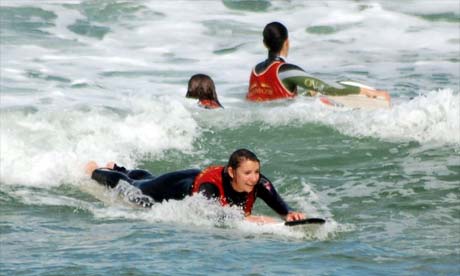 Gemma Bowes surfing