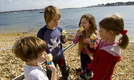 Children on the beach at Brownsea Island, Poole Harbour, Dorset