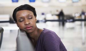 Jetlag: Woman asleep in an airport