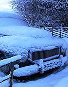 Old car lies buried under snow in Lule&aring;, Sweden