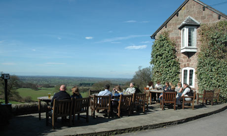 Exterior of Pheasant Inn with view