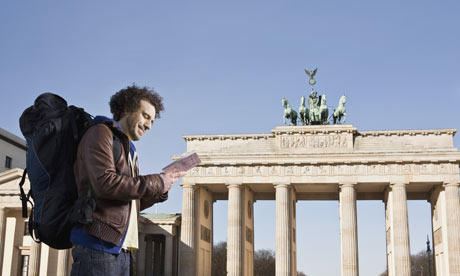 Man sightseeing at the Brandenburg Gate, Berlin