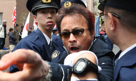 A demonstrator against The Cove dolphin slaughter film in Tokyo, Japan