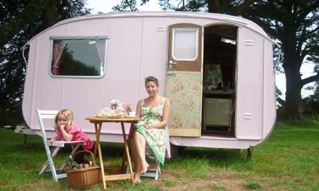 Gemma Bowes and her friend's daughter Isabella outside their vintage caravan