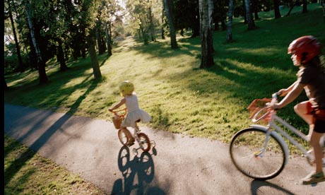 Children cycling on bikes in Sweden