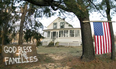 A sign near Sandy Hook School in Newtown, Connecticut, US after the shootings. 